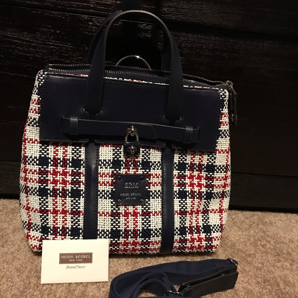 HB red/white/blue tweed convertible backpack.